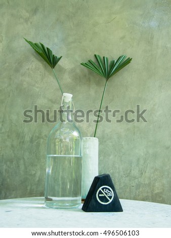 Smoking prohibition Signs and fresh water in the table