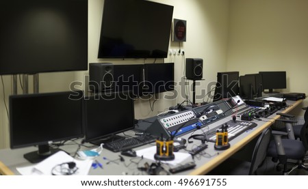 Television Broadcast Gallery. 
Wide shot of vision mixing panel in a television gallery. 
button on the control panel television equipment 