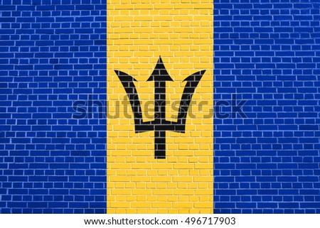 Barbadian national official flag. Patriotic symbol, banner, element, background. Flag of Barbados on brick wall texture background