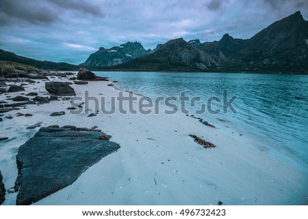 Fjord afrer sunset, Rocky beach in evening, Norway