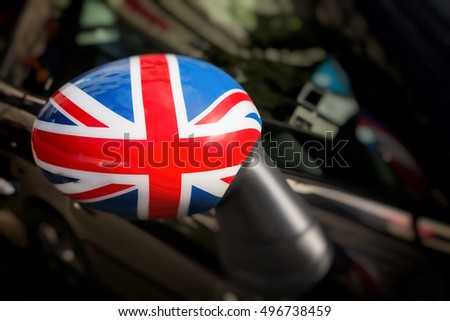 British flag on a side mirror of car