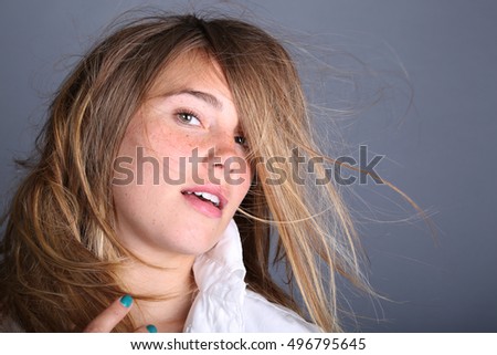 Very cute Image of a young woman in studio