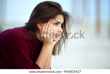 Sad Woman Standing On the Beach. Depression concept Royalty-Free Stock Photo #496803427