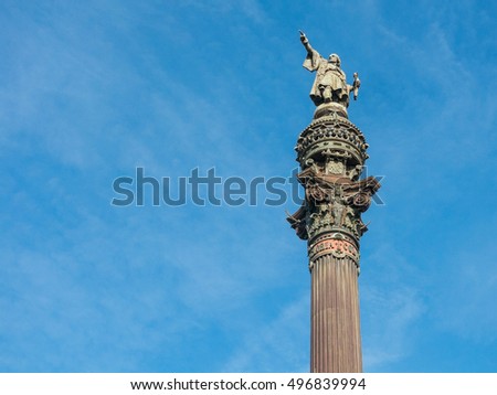 Christopher Columbus monument in the sea front with a blue sky background, in Barcelona city. The Columbus statue is one of the most iconic symbols of the city of Barcelona, Spain.