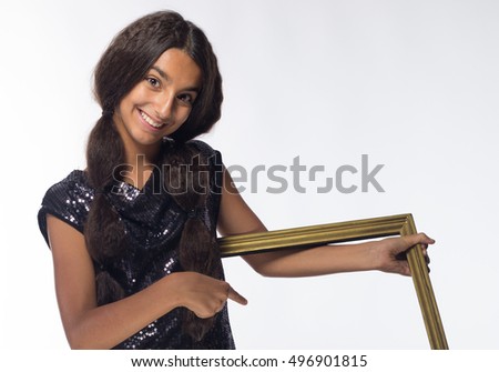 young brunette girl with long hair in black dress with a frame on a white background