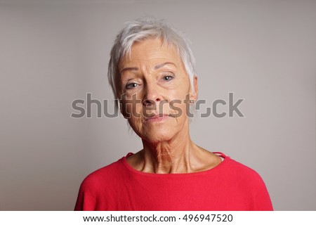 serious mature woman with her head held high