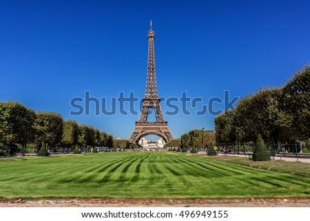 View of Eiffel Tower (La Tour Eiffel). Eiffel Tower is tallest structure in Paris and most visited monument in world. Champ de Mars, Paris, France.