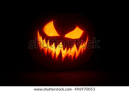 Halloween pumpkin's grin on black isolated background
