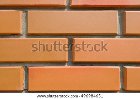 Detail of the house wall. Background of facing bricks