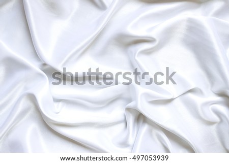 White cloth waves background texture.