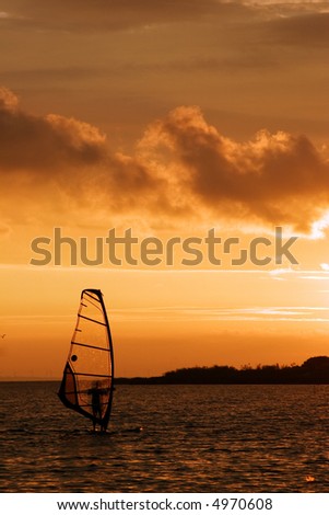 surfing at sunset, recessional landscape