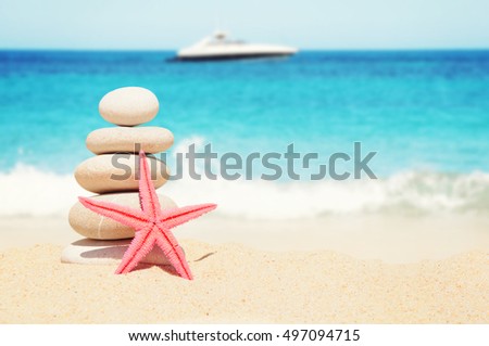 Stones spa treatment scene on the sea beach