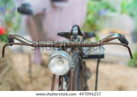 Selective focus of old antique bicycle. Close-up image vintage style
