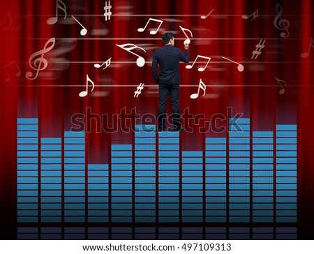 Businessman standing over the sound waves equalizer and drawing the music note on red curtain background,musical concept