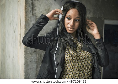 African Woman Listening Music Media Entertainment Relaxation Concept