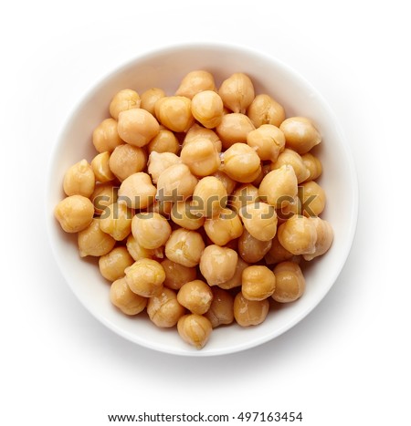 Bowl of preserved chickpeas isolated on white background, top view Royalty-Free Stock Photo #497163454