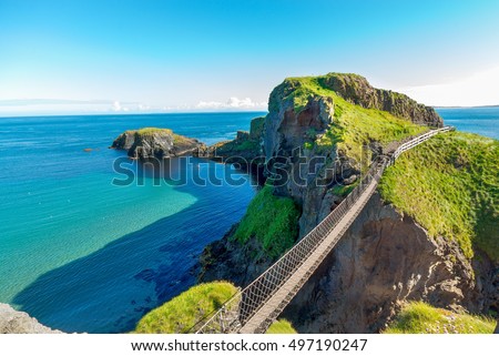 in Northern Ireland rope bridge, Carrick-a-Rede Royalty-Free Stock Photo #497190247