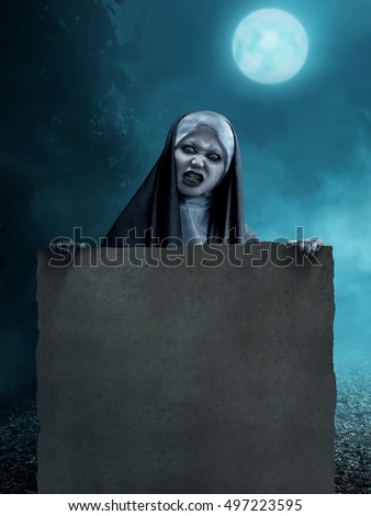 Creepy asian nun holding blank parchment paper in the moonlight