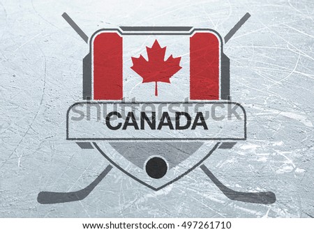 A Canadian crest stamped onto the surface of an ice rink.