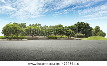 Empty street at the nice and comfortable great garden Royalty-Free Stock Photo #497264116