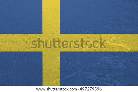 A Swedish flag stamped onto the surface of an ice rink.