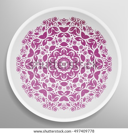 Decorative plate with round ornament in ethnic style. Abstract floral Mandala circular pattern. Fashion background with ornate dish. Home decor background, Interior decoration, kitchen plate.