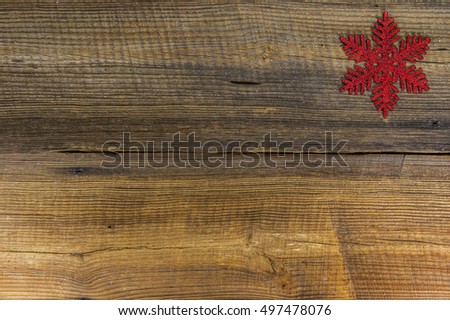 Red star on wooden board. Christmas decorations in vintage style.