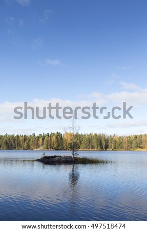 Beautiful autumn day at the lake. Image taken in Finland.