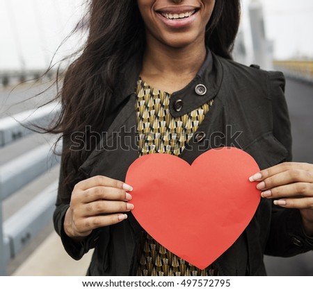 African Woman Holding Heart Shape Symbol Love Concept