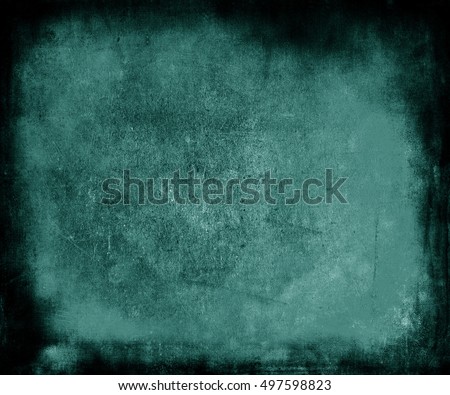 Beautiful abstract old blue paper texture background with frame and faded central area for your text or picture