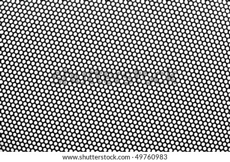 Black metal lattice with round apertures on white background. Closeup.