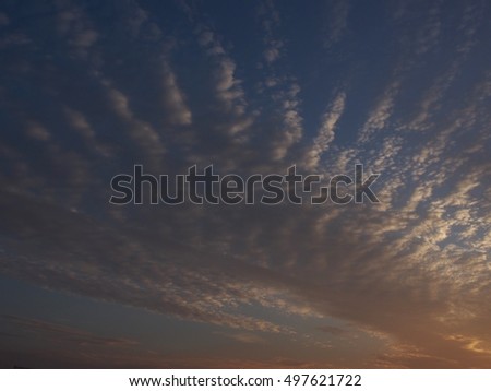 Autumn in Japan, dusk of mackerel sky on dark sky background
