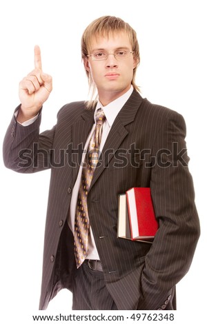 School teacher with books lifts finger upwards, isolated on white background.