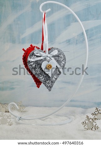  hanging heart on a blue background - The magic of Christmas 