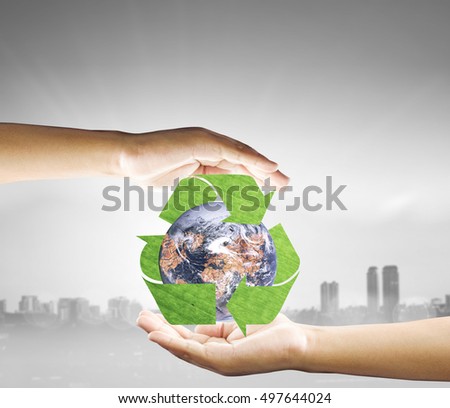 hand make Hologram Environment over blurred city. technology for the Environment. boundless business and technology and Environment on Earth Concept. Elements of this image furnished by NASA