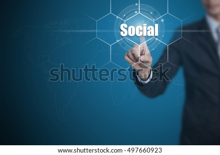 Businessman pressing button on touch screen interface and select Social, Business concept.