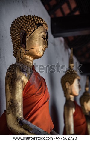 Old buddha statue of old temple in Samutsongkram province. Dramatic photo style