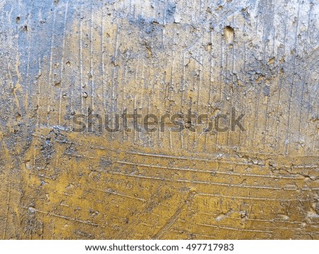 Abstract dirty dark gold cement wall texture background