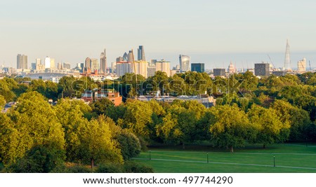 London cityscape seen from Primrose Hill at sunset