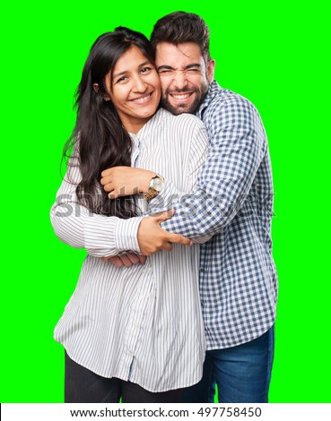 cool couple smiling on white
