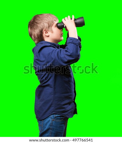 little boy with binoculars