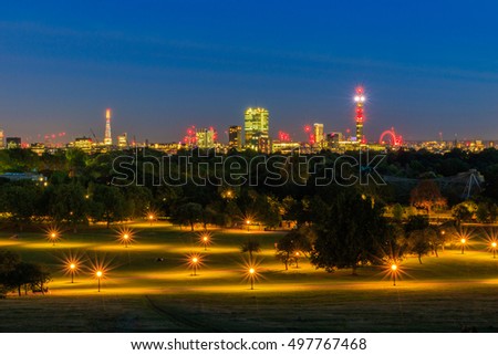 Illuminated London cityscape seen from Primrose Hill at night