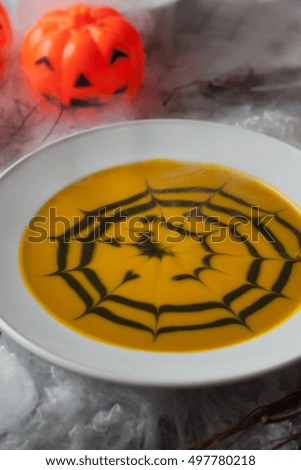 pumpkin soup  with Halloween theme  