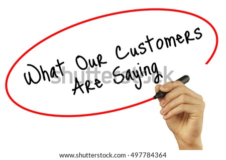 Man Hand writing What Our Customers Are Saying with black marker on visual screen. Isolated on white background. Business, technology, internet concept. Stock Photo Royalty-Free Stock Photo #497784364