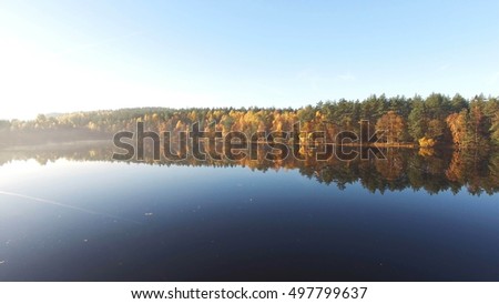 Aerial view of magnificent lake at autumn season, in Poland