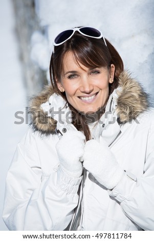portrait of a smiling woman in winter