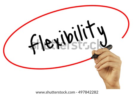 Man Hand writing Flexibility with black marker on visual screen. Isolated on background. Business, technology, internet concept. Stock Photo