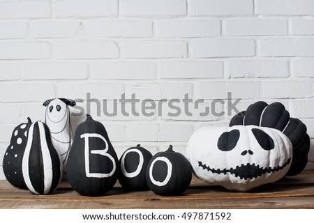 Black and white pumpkins. Home decoration for Halloween. 