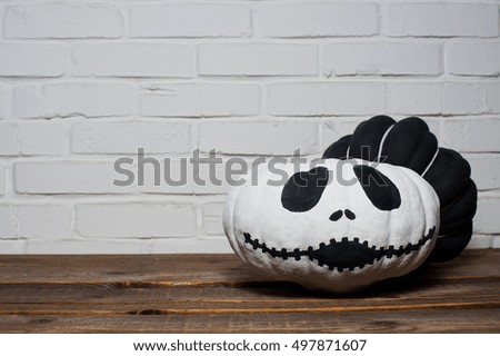 Black and white pumpkins. Home decoration for Halloween. 