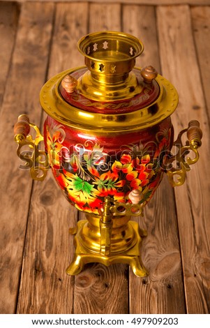 Traditional Russian samovar on a wooden table